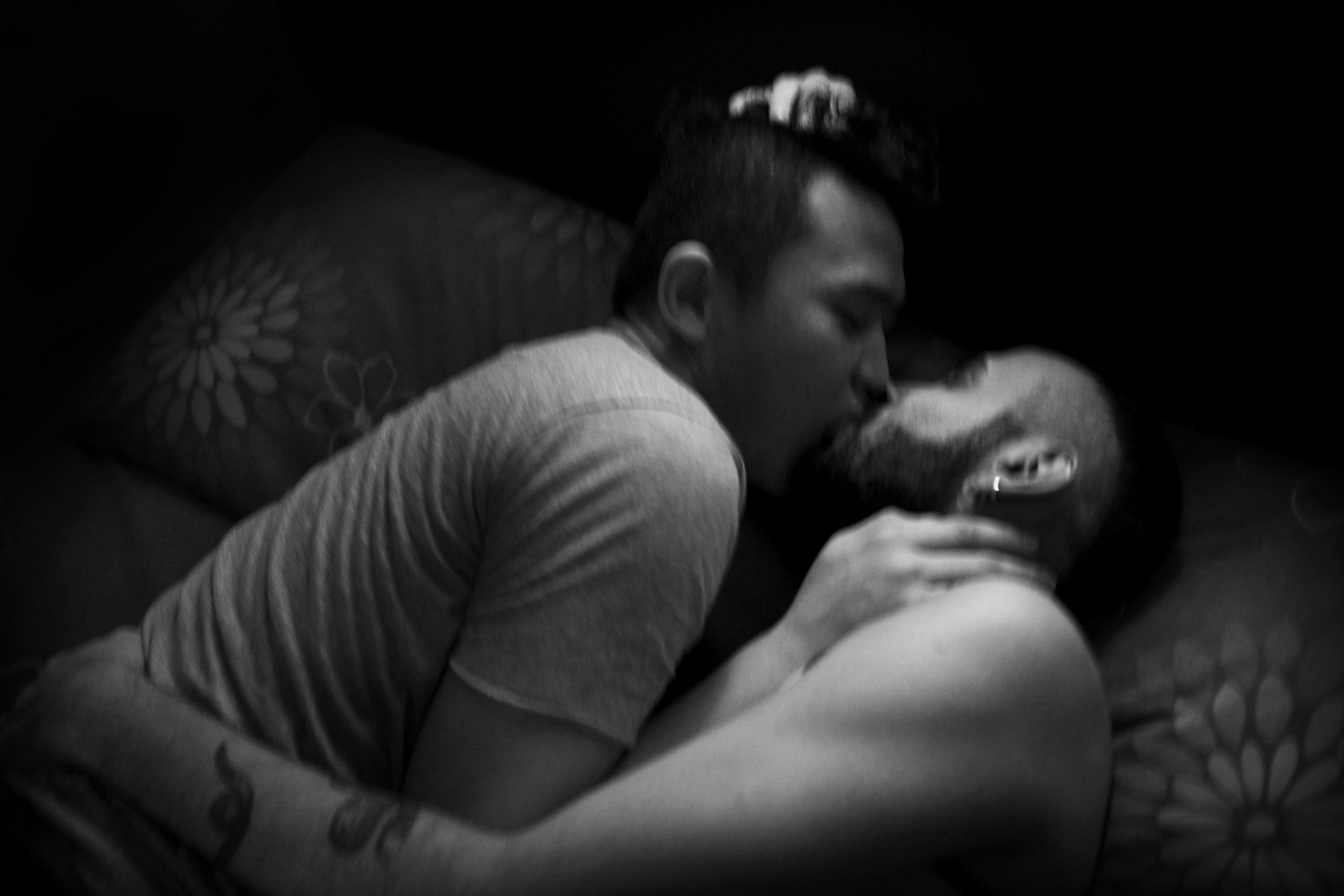 © Hashem Shakeri. 	(2014) Pedram and Gibbson are caressing each other in home . Cyberjaya, Malaysia. Homosexuality is illegal in the Islamic Republic of Iran, just like other Islamic countries.  Pedram is a 26 year old homosexual who lives in Iran. He was forced to emigrate from Iran 4 years ago despite his real love for his partner. Although his family did their best to understand his situation, social oppression, limitations, insults and harassments obliged him to emigrate to Malaysia . It has been a year and a half that he has been living with his new partner, Gibbson, in Cyberjaya, Malaysia, continuing his studies and developing his art.